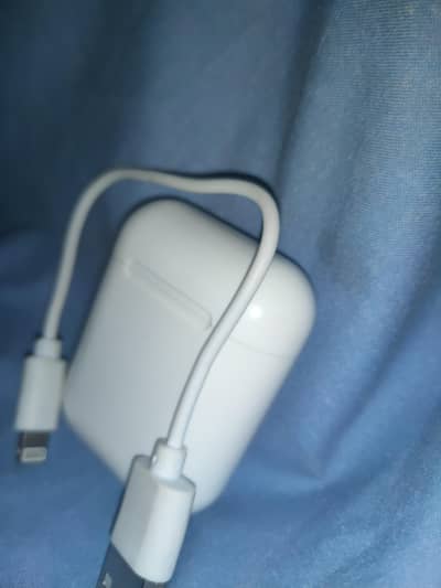 i12 earbirds with USB charging cable