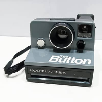 1980s English Polaroid "The Button" Polaroid Land SX-70 Film Camera