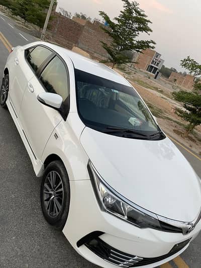 Toyota Corolla Altis 1.6 super white