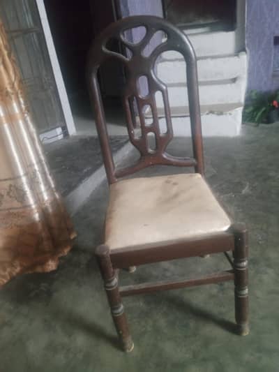 pure wooden table and three chairs