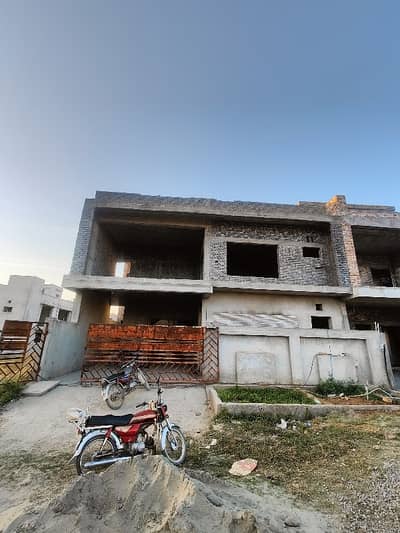 10 Marla Sun Face Gray Structure House Available For Sale In Health Enclave E-18 Islamabad.