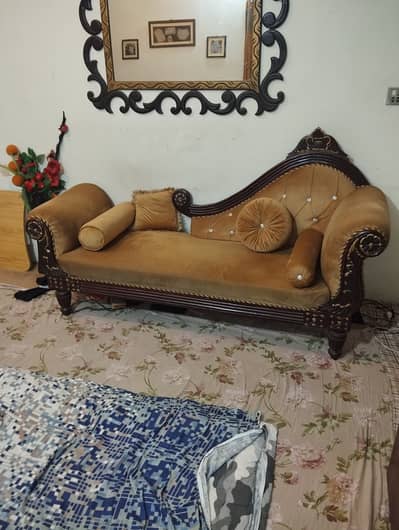 Royal style Dewan wooden sofa.