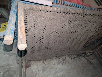 two handmade iron charpai