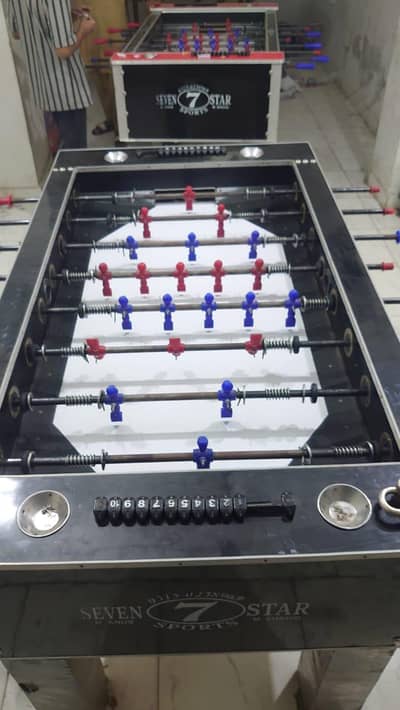 football game (Patti) and carrom