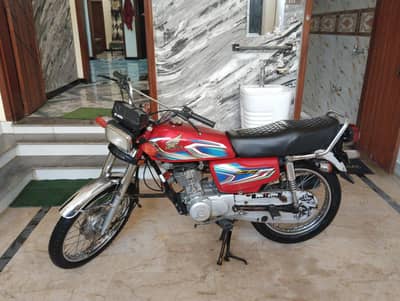 Honda 125 red urgent sale