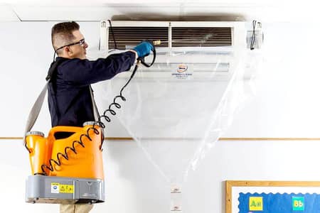 AC cleaning service with Pressure Washer