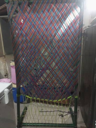 single iron charpai