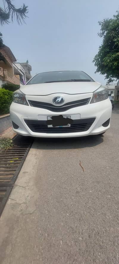 TOYOTA VITZ FRONT BUMPER FULLY GENUINE  IN WHITE COLOUR OF 2014 MODEL