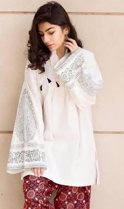 Women Embroidered Lawn Suit white printed trousers