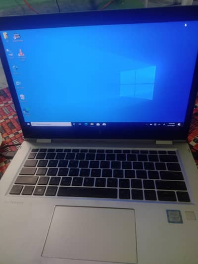 HP x360 convertible core i7 7th 8gb Ram 256gb nvem sad touch