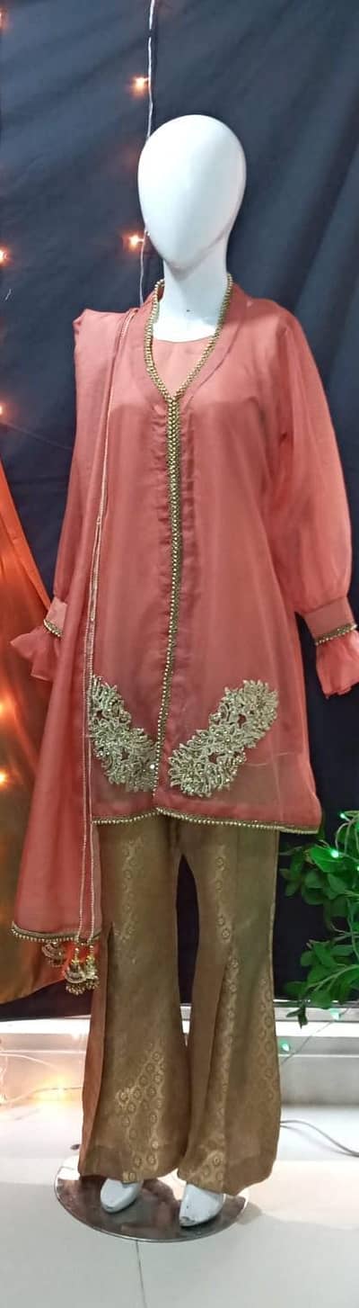 organza peplum with trouser and double shaded dupatta