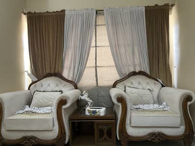 7 seater sofa, 3 sets of tables and 1 curtain of same theme