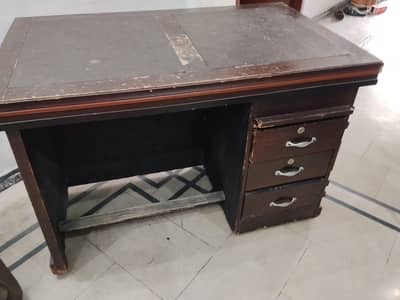 Office table with revolving chair