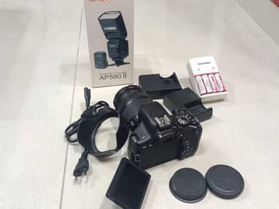 Canon 750D with 18-135 zoom lens apika flash