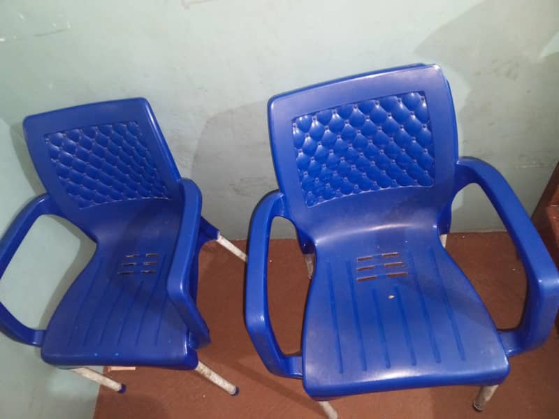 Two Plastic Chairs 1