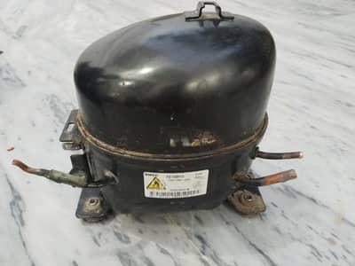 Scrap refrigerator compressor