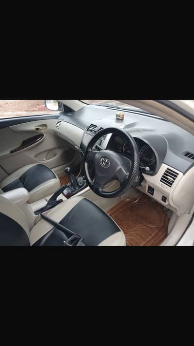 Toyota Corolla Gli 2013 Total ganiune 100 percent Very Outclass Condi