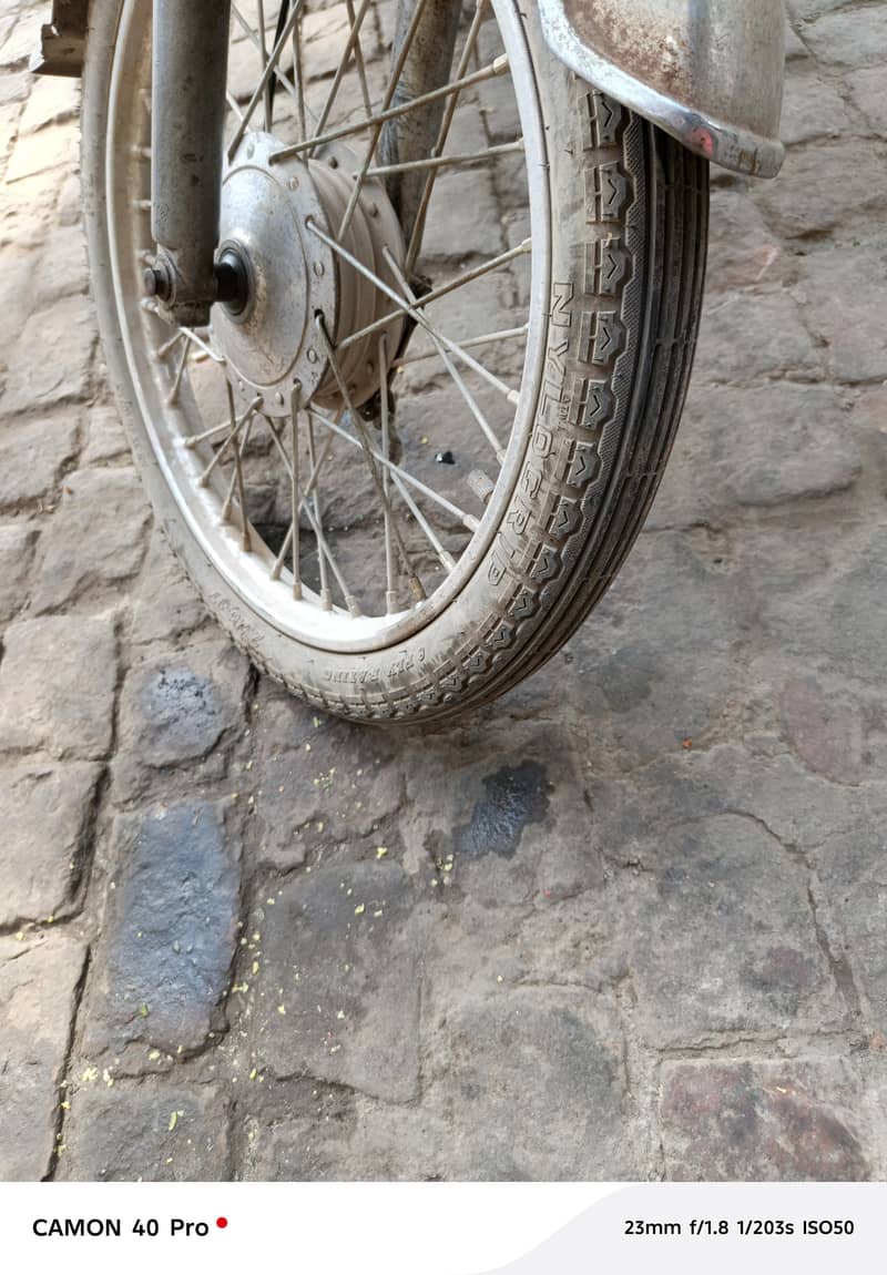 Dhoom 70cc 4