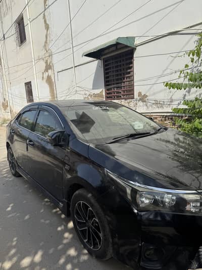 Altis grande 2015 , New rims tyre installed , chilled AC
