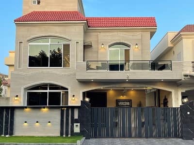 Brand new luxury designer 10 marla house 5 bed accommodation 2 American kitchen 1 Servent two species TV lounge available for sale in Bahria Enclave Sector C1
