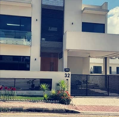 1 Kanal luxury designer house avaliable 5 bed accommodation 1 American kitchen 1 Servent two species TV lounge available for sale in Bahria Enclave Sector C