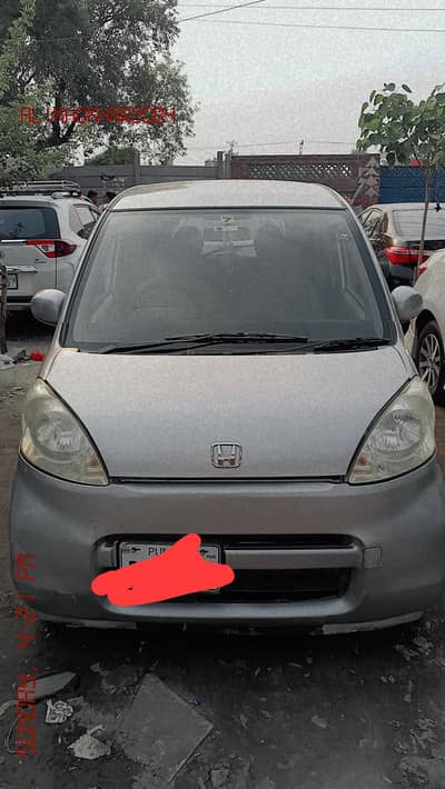 Honda life 2007  2011 ola number ha