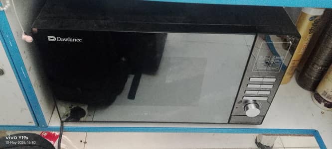 dawlance microwave oven 10 by 10 condition colour black timer system