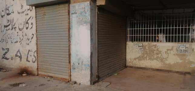Shop Double Shutter 3 Side Corner With Attached Bath Extra Land Lease 200 Feet Road Facing Vip Location North Karachi Sector 11A