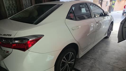 2021 altis 1.6 corolla X 22000 geniun mileage bumper to bumper geniun