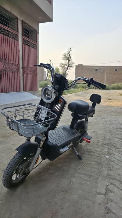 Crown electric magic scooty
