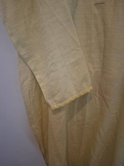its an ethnic 2 piece set in butter yellow color.
