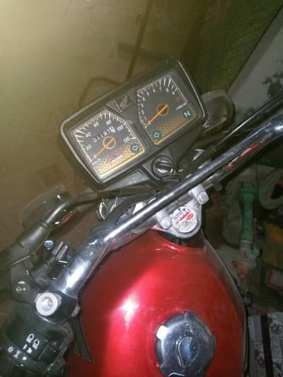 Honda 125 red golden special edition.