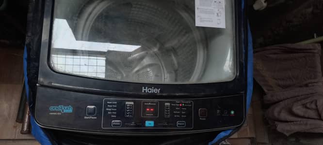 Automatic Heier washing mach for 9kg in New condition 0.3. 1.6. 42.42869