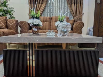 Wood-based coffee table up for sale.