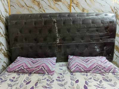 leather and wood new bed