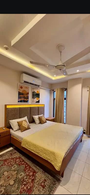 Par Day and short Time One and Two BeD Room appaertment Available for rent Bahria Town Phase 4 and 6 Empire Heights 2 family apartment any time
