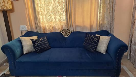 3 seater velvet sofa with matching rug