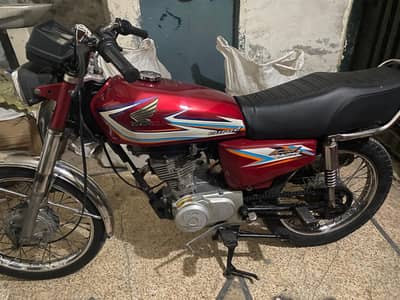 Honda 125 16 model total genuine condition 10/10 koi kam nhi hona wala