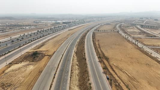 1000 Sq Yd Plot For Sale Bahria Golf City, Bahria Town Karachi Near Road 1, Jinnah Avenue View, Built-Up Villas Nearby & Huge Greenbelt | Ready-to-Construct | Best for Future Investment.