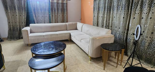 2 sets of L Shape Sofa with 2 layer center table and 3 layer side tbl