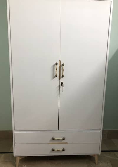 King size bed and white deco wardrobe