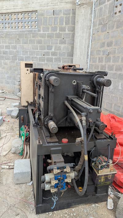 Injection molding maintenance work. .