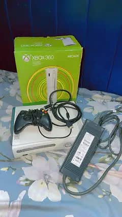 Xbox 360 console  with black colour wire controller. .