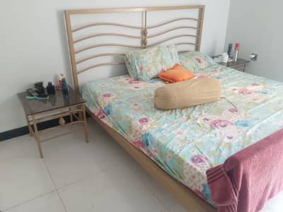 King size bed with side table