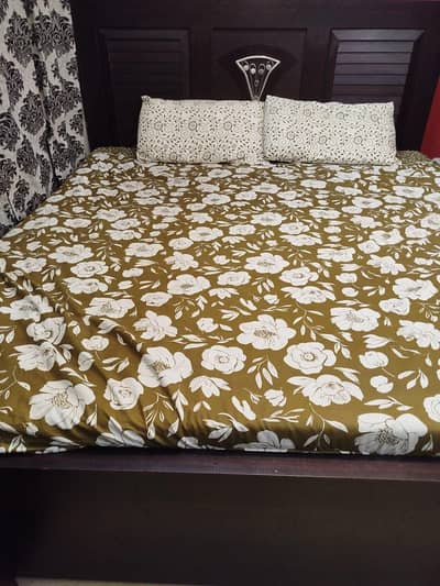 King size bed with side table