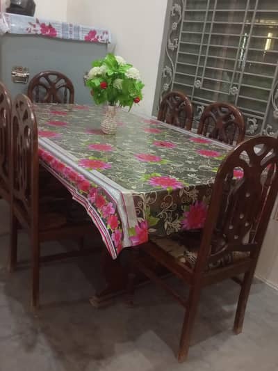 wooden table and chairs