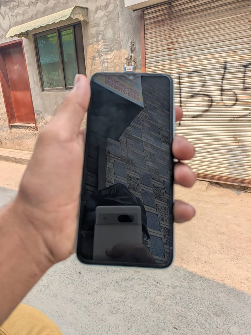 Redmi A2+ 1