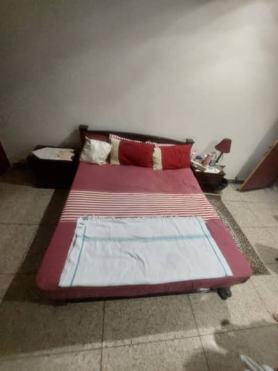 Queen size bed with side tables