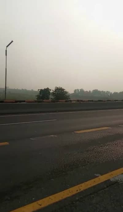 Best investment Ideal Prime Location for Housing Society Land Raqba for sale on Main Road of New Airport Fateh Jung Road Islamabad