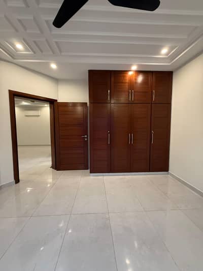 10 Marla Beautiful Ground Portion with 6 marla green lawn Available for Rent in Bahria Town Phase 8, Sector I